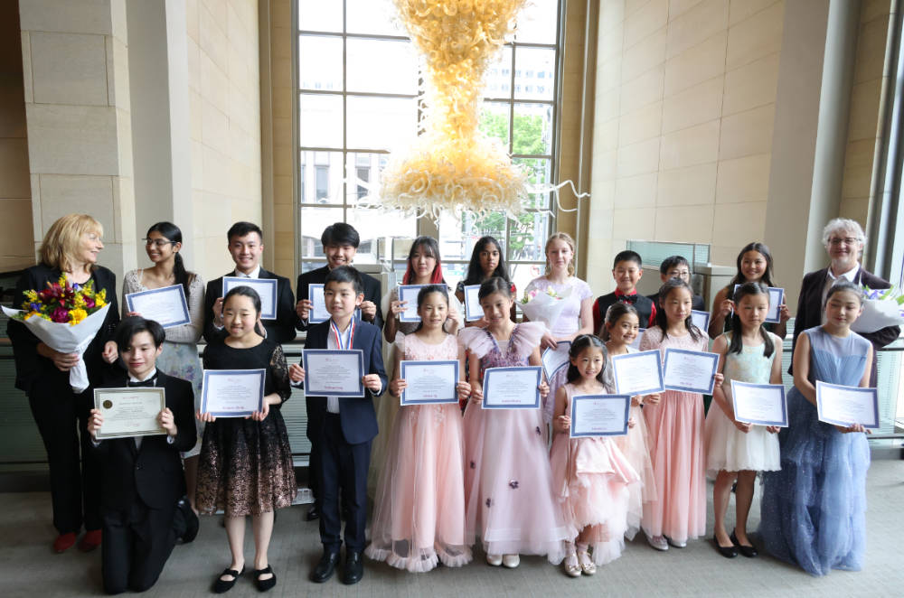 Offering the highest classical music education in Sammamish and Issaquah, this image shows students after their 2023 Honors Recital at Benaroya Hall